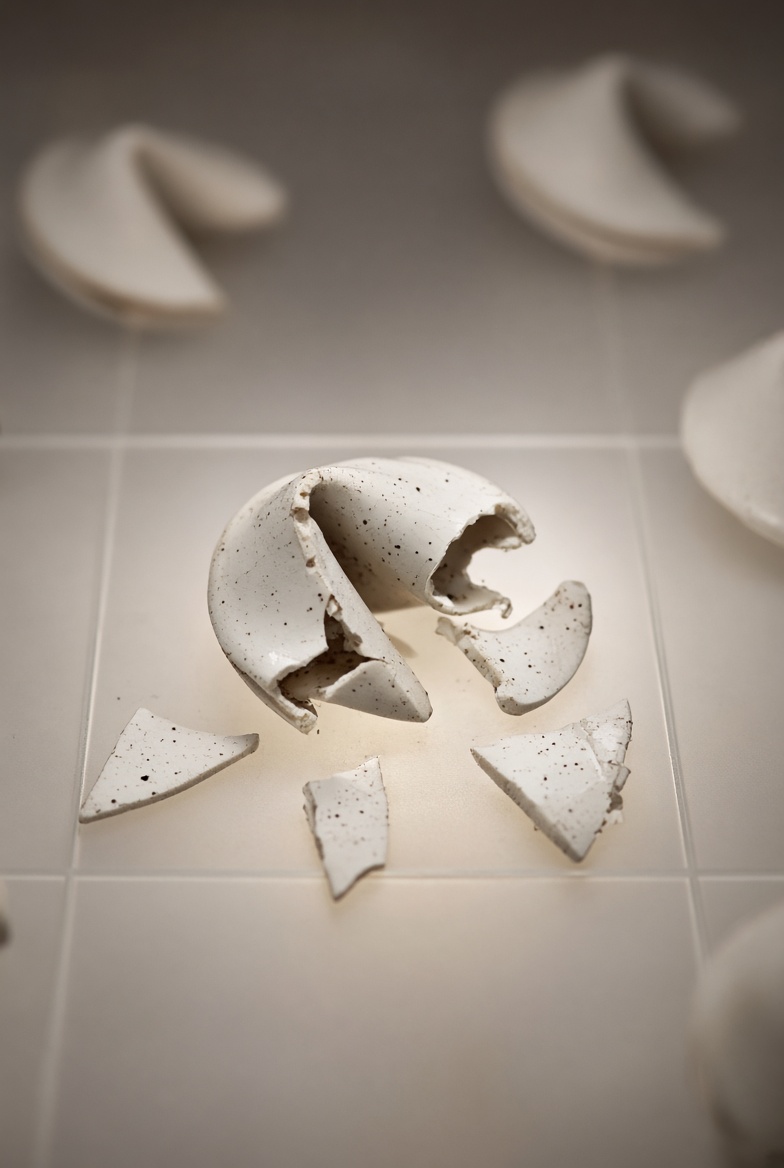 Broken porcelain fragments remaining in a single grid position.